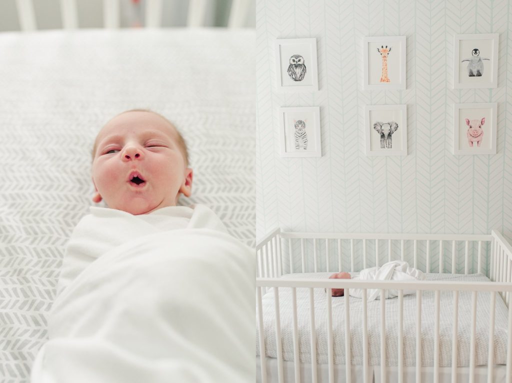 newborn baby girl swaddles in crib