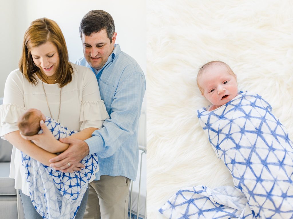 newborn baby boy in blue and white blanket on soft white blanket