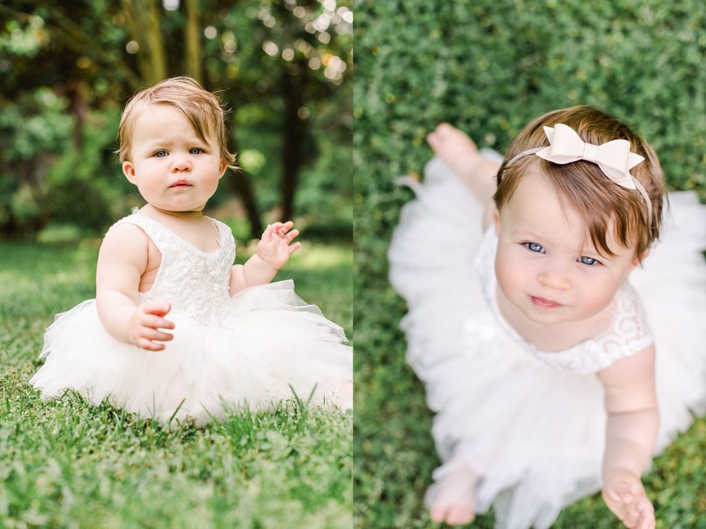 one year old girl in white dress